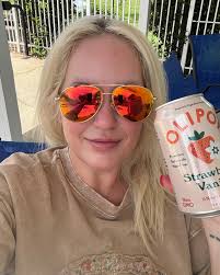 Summer days... girls in the sunshine... mom and I in the shade.