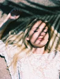 blonde with palm shadows over face in lace by wendy laurel ...