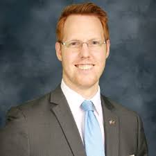 Professor Bob Rigg and a group of Drake Law student-attorney volunteers…