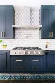 Lovely kitchen features gray blue cabinets paired with white quartz countertops and a marble chevron tiled backsplash. 190 Blue Cabinets Ideas Kitchen Inspirations Kitchen Design Blue Cabinets