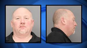 Fond du Lac's Madelyn Flanagan serves up ice cream with a smile at Dock  Spiders games