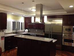 Cherry cabinets have been a staple in rustic, traditional, and modern kitchen designs for many years. Espresso Cherry C C Cabinets And Granite
