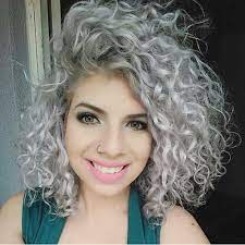 View yourself with this short curly light platinum blonde shag hairstyle with layered bangs. Short Curly Hair Ideas For Summertime Styles Art Platinum Blonde Hair Colored Curly Hair Silver Blonde Hair