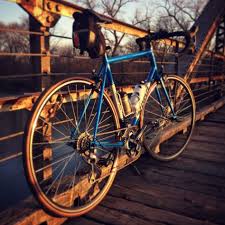 Features with brown sidewalls and the original conti sport tread pattern from 1982. Pin Pa Kona Road Bikes