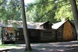 It is a rustic cabin with wood floors, but offers all modern amenities. Cook Forest State Park Log Cabin Inn Environmental Education Center Cooksburg Pa Living New Deal