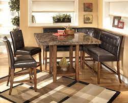 Before purchasing a new dining table, read our guide to understand how many chairs can fit around various sizes of rectangular, round, oval, and square dining tables. Elegant Kitchen With Fabulous Corner Nook Kitchen Table Faux Granite Top Square Kitchen Table Dining Room Sets Brown Dining Table Counter Height Dining Table