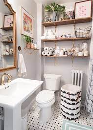01 of 18 add a shelving unit above the toilet Small Bathroom Mirrors If Your Bathroom Is Small And You Want It To Look Bigger Midcen Small Bathroom Furniture Bathroom Decor Apartment Small Bathroom Decor