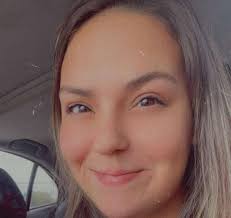 Can someone fix my sister's eyes in this photo?