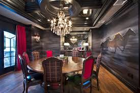 Small lamps on side tables, end tables, and dressers. Dark Dining Room With Blurred Wall Look Decorative Black Molding Ceiling And Large Circular Dining Table Hgtv