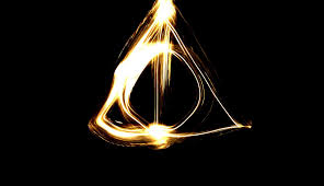 Harry Potter And The Deathly Hallows Symbol Wallpaper High Definition For Hd 1080p Defi Deathly Hallows Symbol Deathly Hallows Wallpaper Harry Potter Wallpaper