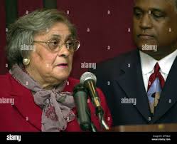 Essie Mae Washington-Williams, the 78-year-old daughter of the late Sen.  Strom Thurmond and a black maid, speaks during a news conference Wednesday,  Dec. 17, 2003, in Columbia, S.C. On the right is
