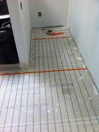 Put Some Heat In The Bathroom With Heated Floors Heated Bathroom Floor Heated Floors Flooring