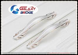 Our artisan line of hardware is handcrafted at a fine arts foundry to produce a distinctive line of knobs, pulls, back plates and appliance pulls. Luxury Kitchen Cupboard Door Handles Ivory White Rose Gold Bedroom Furniture Pulls