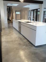 The Variation In These Burnished Concrete Floors Comes From The Swirling Motion Concrete Stained Floors Concrete Kitchen Floor Floor Design