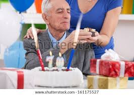 There are small and big presents which are welcome by every man at the age of 70. Senior Man Celebrating 70th Birthday And Receiving Birthday Gift Stock Images Page Everypixel