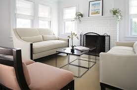 The styling of this room above is lovely with its chinese chippendale daybed and hide rug. 20 Living Areas Charmed With Simple Roman Shades Home Design Lover