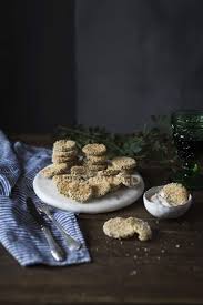 Maybe you would like to learn more about one of these? Fried Zucchini Slices In Bread Crumbs Served With Bowl Of Dip Sauce On Table Recipe Cream Stock Photo 185833558