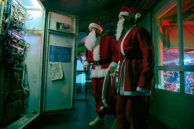 Jingle Bell Heist' Review: Two Aggrieved Strangers Plot Payback Crime