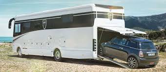 Floor plans sorted by collection. Luxury Rv Can Carry A Smart Car Inside Its Garage Curbed