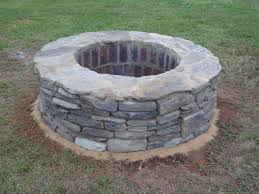 Leave a gap at the corners to add a cut cap. Diy Cultured Stone Fire Pit With Natural Flagstone Top Fire Pit Brick Fire Pit Fire Pit Ideas Uk