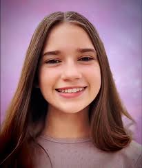 Humorous moments in youth football with the broom lady