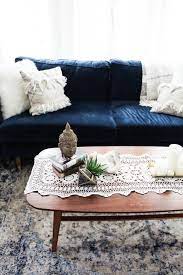 Mixing textiles is an easy way to give your space a romantic, undone vibe. 3 Ways To Style A Coffee Table Home Decor Urban Outfitters Furniture Living Room Designs