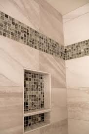 Taupe Tiled Shower With Accent Mosaic Tile Strip And Niche Tile Shower Niche Small Bathroom Makeover Bathroom Shower Tile