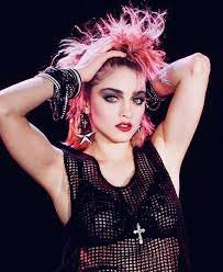 While nowadays coating your lashes with shades of burnt orange, green, or cobalt is normal, back in the 80s, colored mascara was a revolution. Madonna Madonna 80s Madonna Fashion Madonna Costume