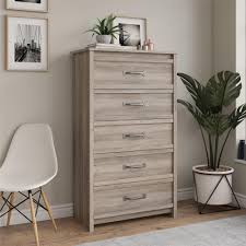 Lend your bedroom a little rustic appeal with this nightstand boasting a color palette of sophisticated grey and black and a quirky distressed finish. Better Homes Gardens Rustic Ranch 5 Drawer Dresser Gray Oak Walmart Com Walmart Com