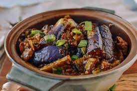 2 medium size brinjal, cut into medium size strips 1 slice 'mei xiang' salted fish, rinsed 3 gloves garlic, chopped 3 stalk curry leaves, rinsed salt & pepper to taste 1/2 tspn vegetarian granules 2 bird eye chilies, sliced. Cantonese Eggplant Casserole èŒ„å­ç…² The Woks Of Life