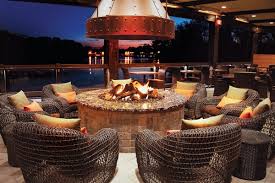 Sadler wood burning fire pit from hampton bay has eye catching decorative legs paired with a rubbed bronze fire bowl that is sure to make any patio pop. 60 Round Fire Pit Enclosures Anf Fireboulder Com Natural Stone Fire Pits Fireplaces And More