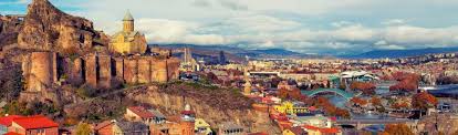 There is a castle tower next to it which you can climb up to, but to get cool photos you will have to attempt a risky climb while on the top. Dentons Tiflis