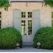 Debby Tenquist On Instagram Making An Entrance Fab Big Clipped Boxwood A Pair Of Aged Finials Paint Painting Shutters French Country Style Limestone House