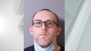 On Tuesday, August 17, around 3 p.m. Hudson Police received a report that a  man was attempting to illegally remove his vehicle from an impound lot off  Green Street.