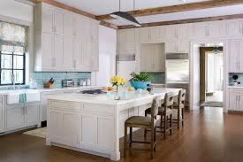 For this light blue kitchen the cabinets were painted in a semi gloss called spectra blue by phi builders + architects. Aqua Tiles With Gray Cabinets Transitional Kitchen