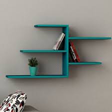 Guardian of knowledge or passion, the library is a key element in a home. Latitude Run Schweberegal Wooden Wall Shelves Wall Shelves Wall Bookshelves