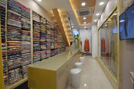 Saree Showroom Design By Sameer Sherawale Retail Store Interior Design Showroom Design Fabric Store Design