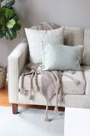 The Right Way To Display Throw Blankets On Your Couch The Diy Playbook Couch Throw Blanket Living Room Throws Sofa Throw Blanket