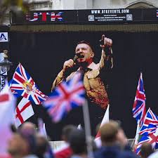 Saturday's "Unite the Kingdom" rally drew an estimated 50,000 union jack  waving far right anti immigration demonstrators to central London. Led by Tommy  Robinson who urged supporters to move beyond street protest