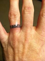Pin By Stacey Welch On My Happy Home Wedding Ring Tattoo For Men Wedding Band Tattoo Tattoo Wedding Rings