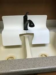 white kitchen sink faucet splash guard