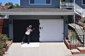 The garage door is a deployable structure that can be placed within a wall frame and works as a vertically opening door. Easy Low Cost Garage Door Makeover Diy