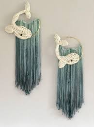Diy macrame wall hanging hanging rope macrame plant hangers hanging light bulbs ideas this macrame wall hanging makes the perfect statement accent piece for the head of your bed, on a beautiful bohemian inspired handmade macrame wall hanging. Hottest Photos Modern Macrame Art Style Wal Moderne Makramee Makramee Wandbehang In 2021 Macrame Patterns Macrame Patterns Tutorials Macrame Wall Hanging Patterns