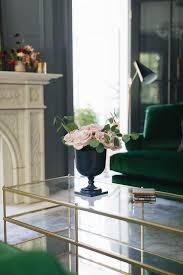Facing Emerald Green Sofas Sit On A Gray Overdyed Rug Flanking A West Elm Terrace Coffee Table Positioned In Front Coffee Table Green Sofa Country Living Room