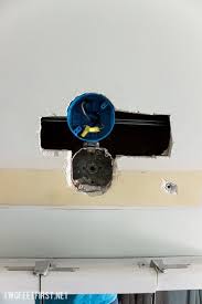 So get the vanity with that nice long back plate that comes off the main fixture and centre it where you want the light to be and then mark the octagon boxes centre on that piece of tin. How To Move Wall Light