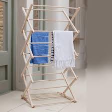 Holes spaced every 4 in. 33 Dreamy Clothes Drying Rack Ideas That Make A Statement Beautiful Decoratorist
