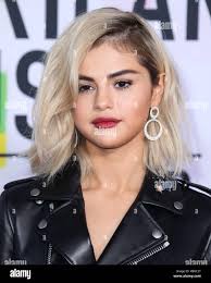 Celebrity black leather jacket blonde smiling hi-res stock photography and  images