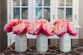 Begin the painting process by taking your brush and swirl it a little on the chalk paint bottle. How To Chalk Paint Mason Jars 7 Of 10 Renovated Faith