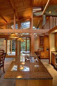 Timber frame homes feature large structural wooden beams visible throughout the interior which act as the structural skeleton of the home. Western Red Cedar Beams And Timbers Real Cedar Timber House Timber Frame Homes Timber Architecture