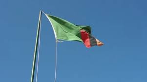 Before that, zambia was the british protectorate of northern rhodesia and used a defaced blue ensign as its flag. Zambian Flag Stock Footage Royalty Free Stock Videos Pond5